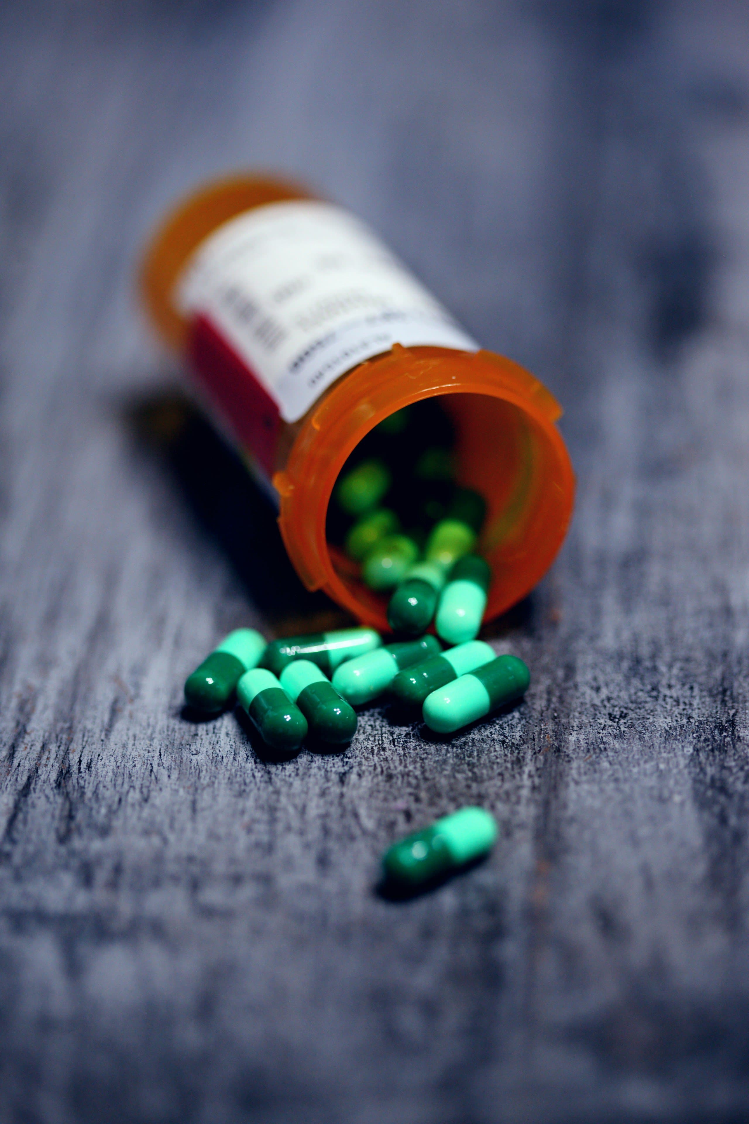 Prescription bottle with capsules ready for transfer